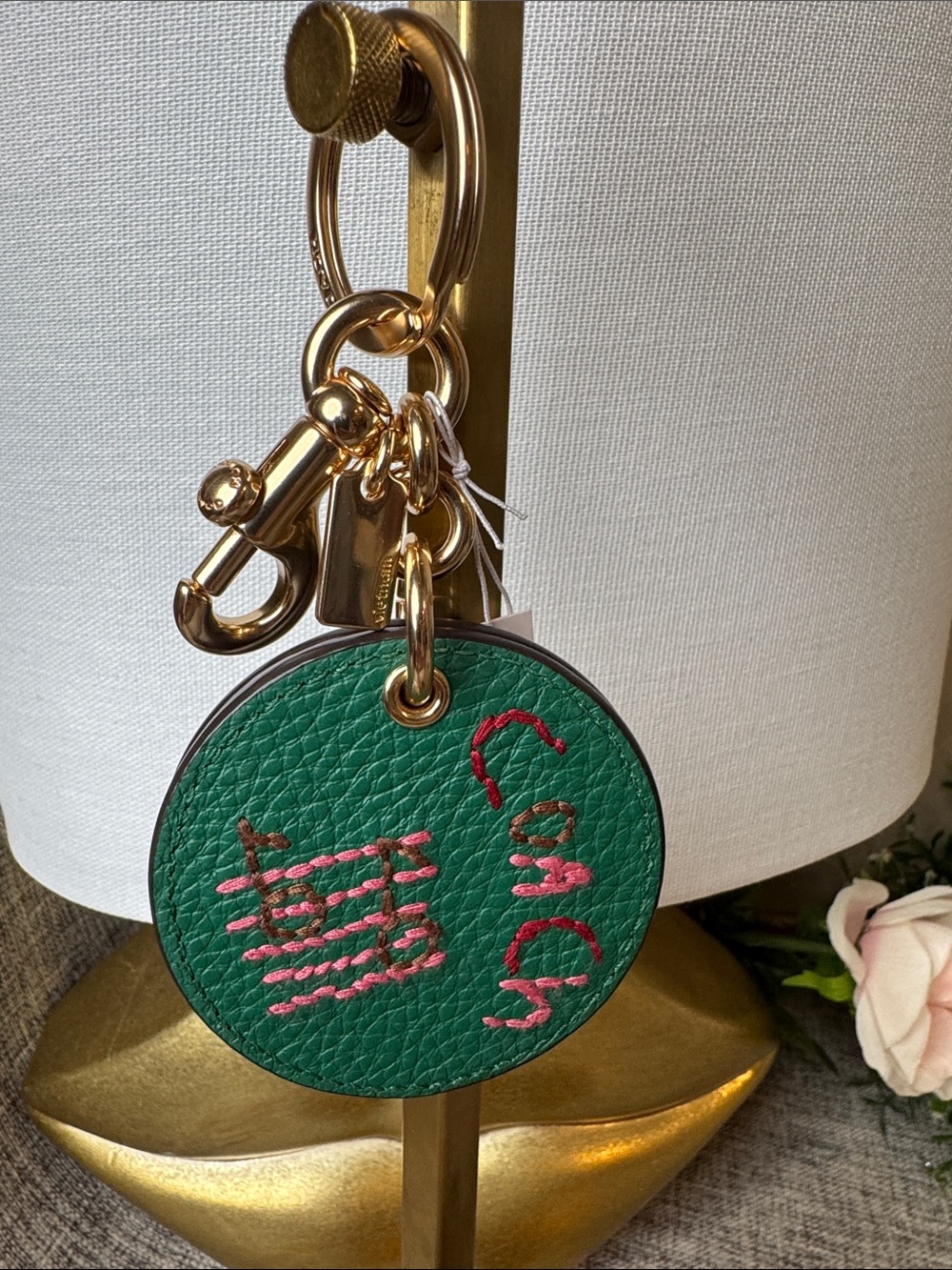 Coach Green Leather Round Key Fob with Pink Embroidered Detail and Gold Hardware